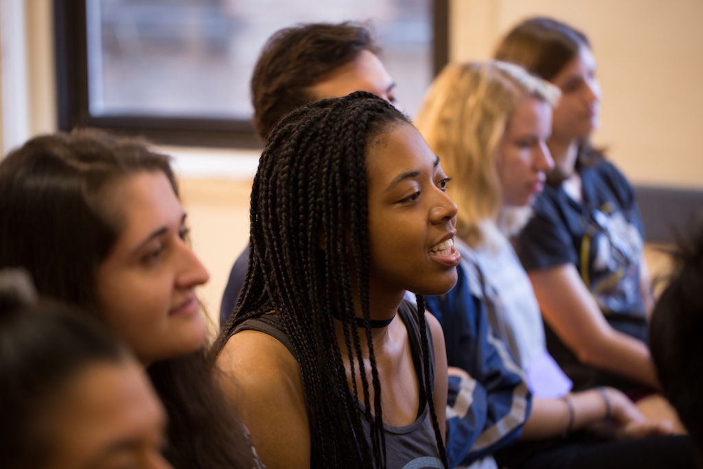 Photo of students engaging in class